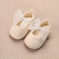 Spring baby toddler walking shoes with mesh upper, lace bow, and non-slip sole in solid colour