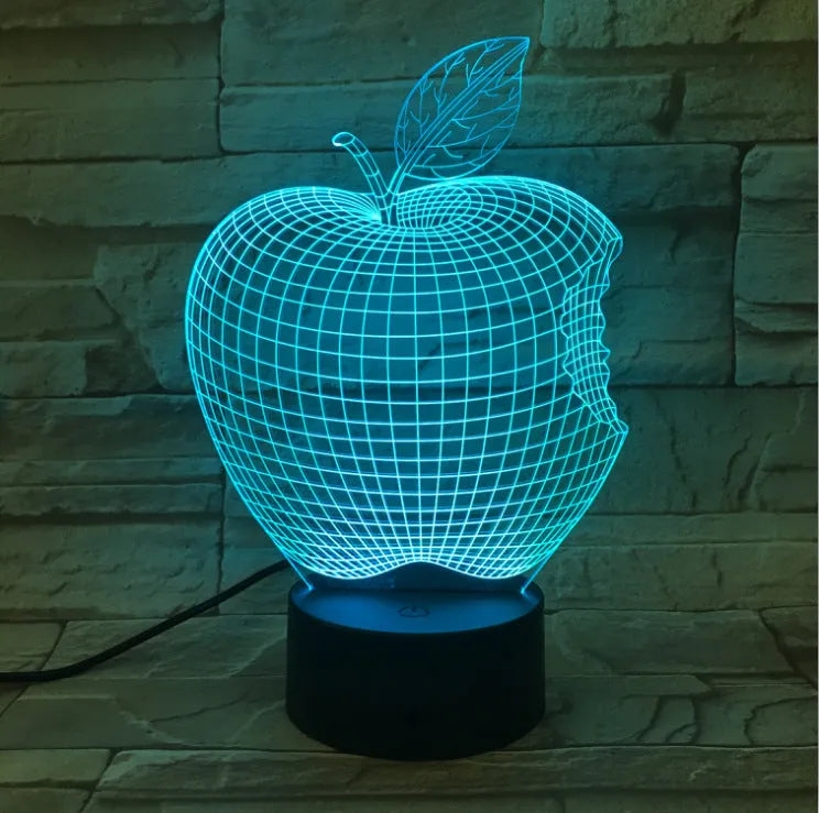 3D fruit shaped colourful LED night light with touch control on wooden surface