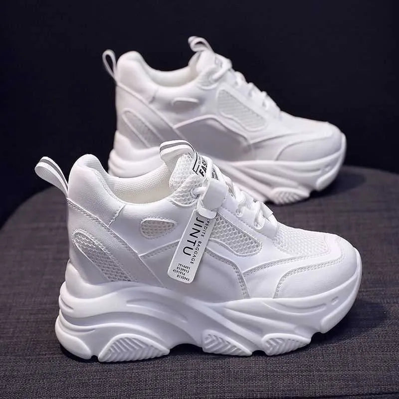 Women's black casual platform shoes with mesh upper and hollow-out design featuring toe holder