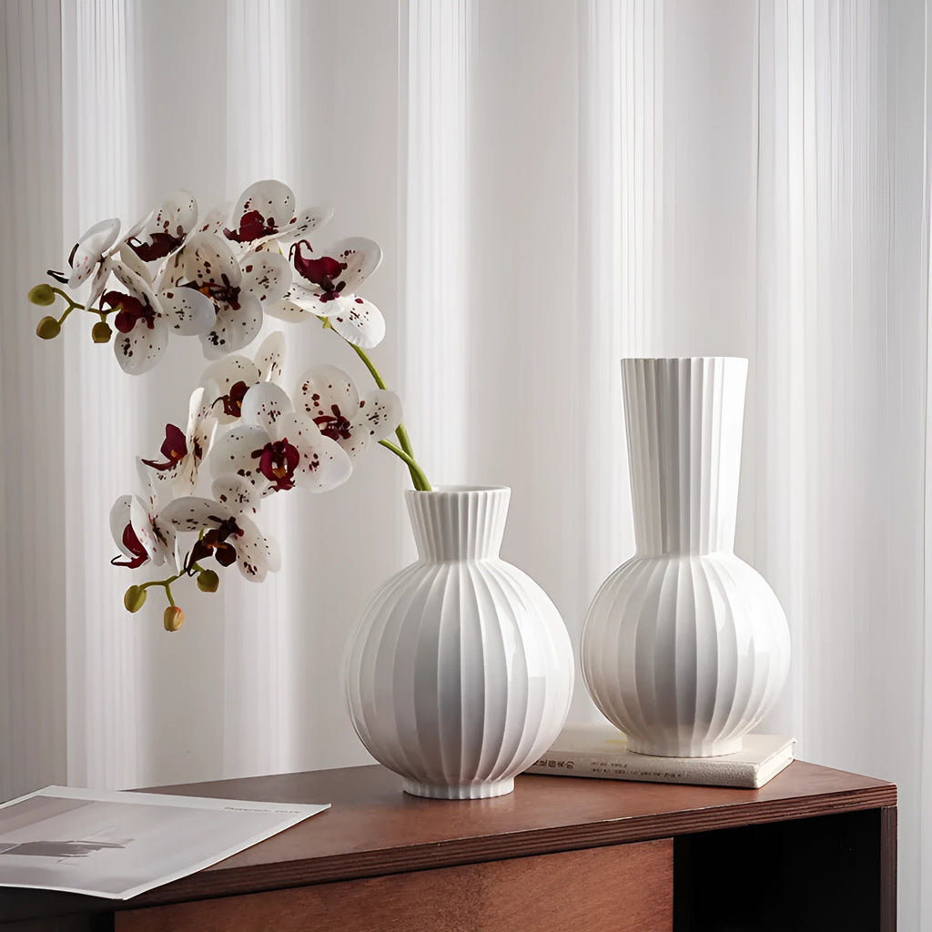 White American country style ball striped ceramic vase with orchid arrangement