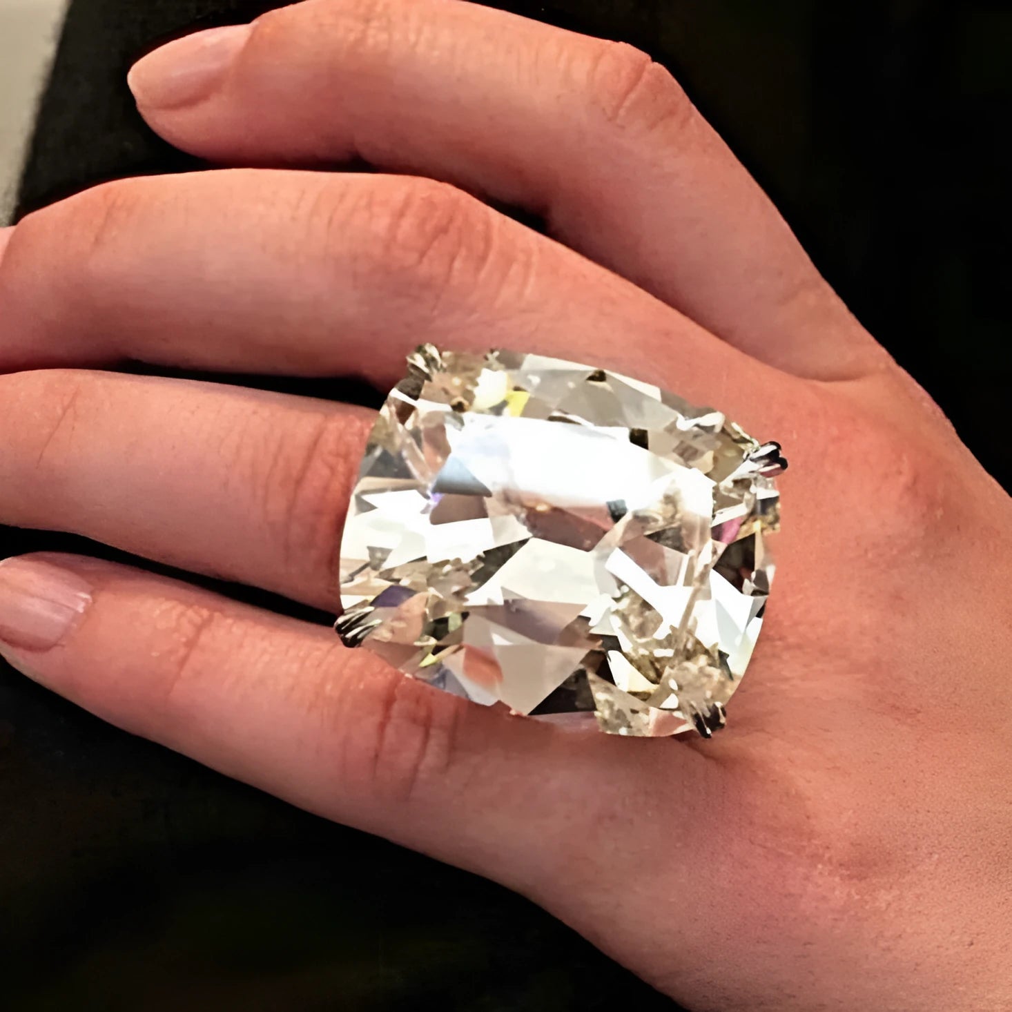 Simple geometric women's alloy ring with square detailing in white gold colour finish.