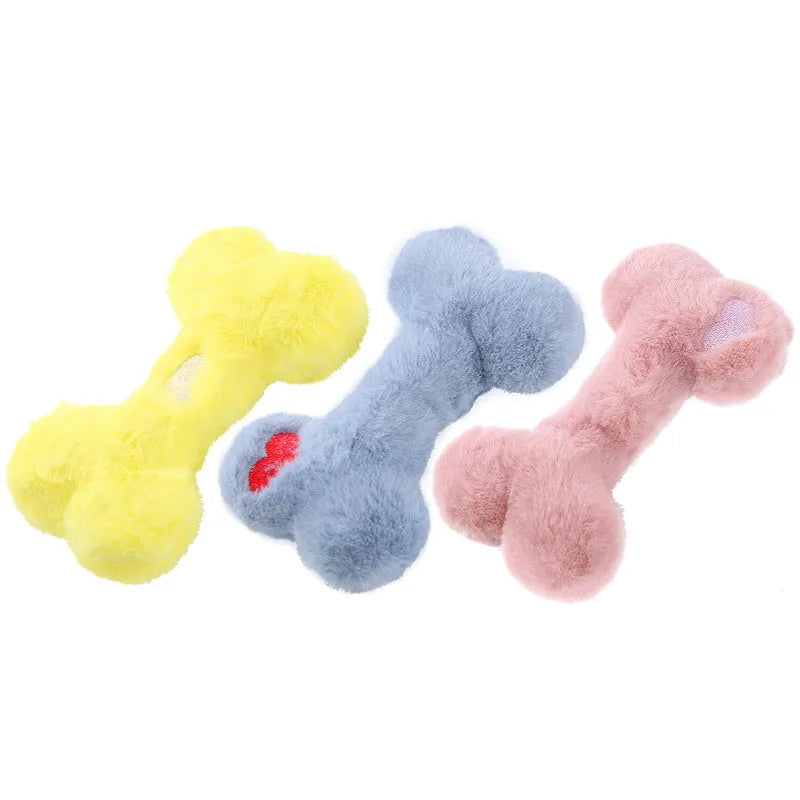 Plush bone-shaped dog toy in blue, pink or yellow with a squeaker for interactive chewing play.