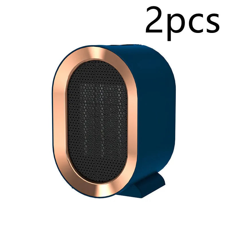 Desktop electric ceramic heater with mechanical controls and fan vent