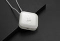 Mini USB portable air purifier necklace in collar design shown in blue, grey, pink and white colours.