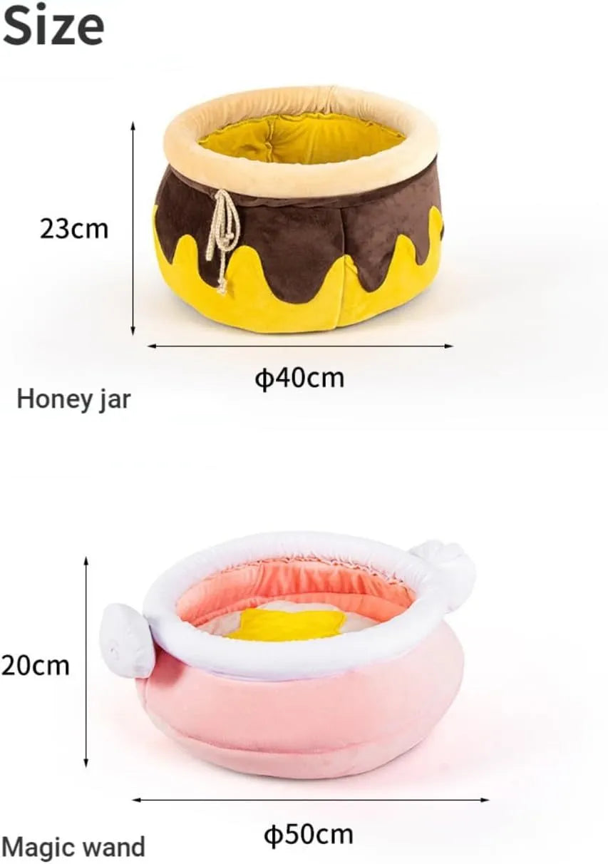 Pink honey pot shaped cat sofa bed with decorative wands and removable pad