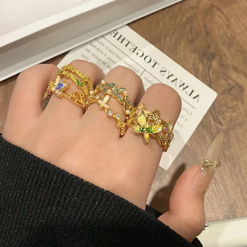 Adjustable open loop copper butterfly ring for women in a creative Chinese design.