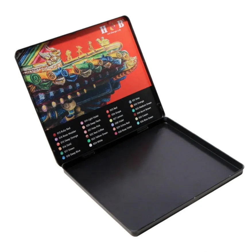 24 water-soluble coloured pencils in metal tin box measuring 21cm by 18cm