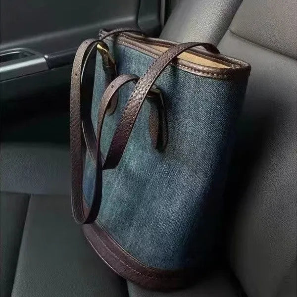 Denim colour patchwork retro bucket handbag with a single shoulder strap.