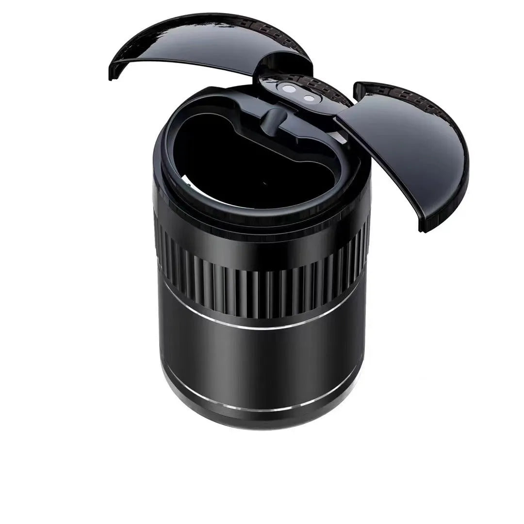 Compact metal car ashtray with lid in black, showing automatic sensor or touch controls.