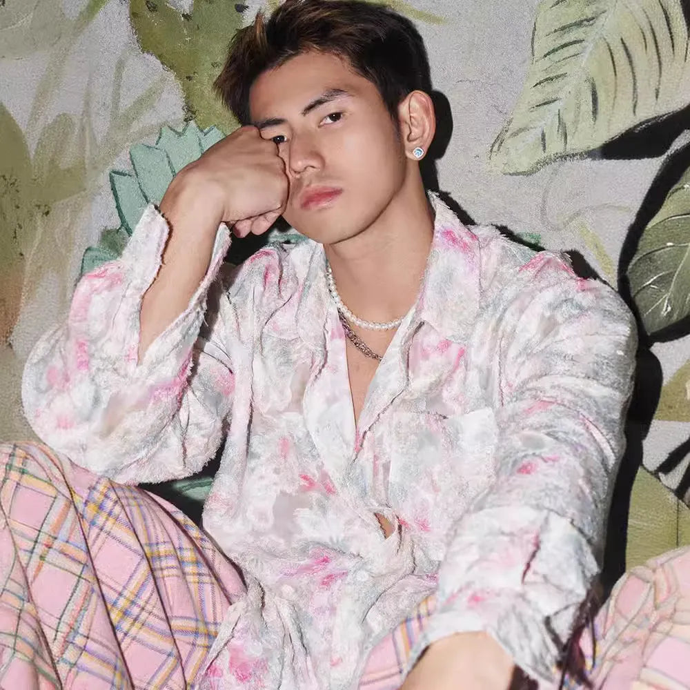 Long sleeve floral shirt with embossed three-dimensional pattern in polyester blend fabric available in pink or blue