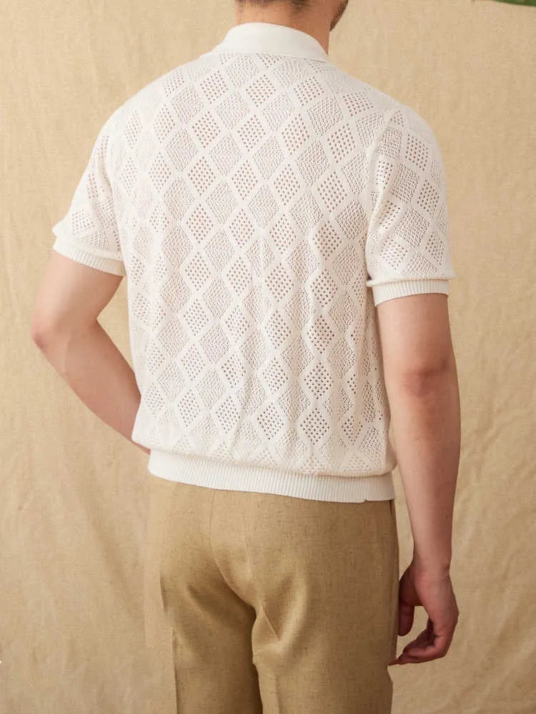 Light brown men's cotton cardigan with zipper front and lapel collar on a hanger.