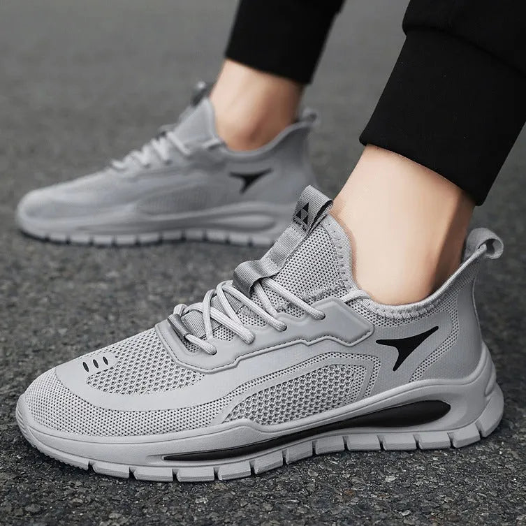 Mens breathable woven mesh low top lace up sports shoes in black and gray with PVC sole