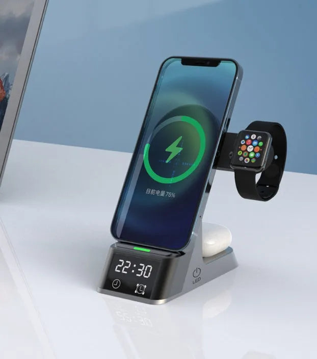 Black six-in-one wireless charging alarm clock station with digital display and charging pad.