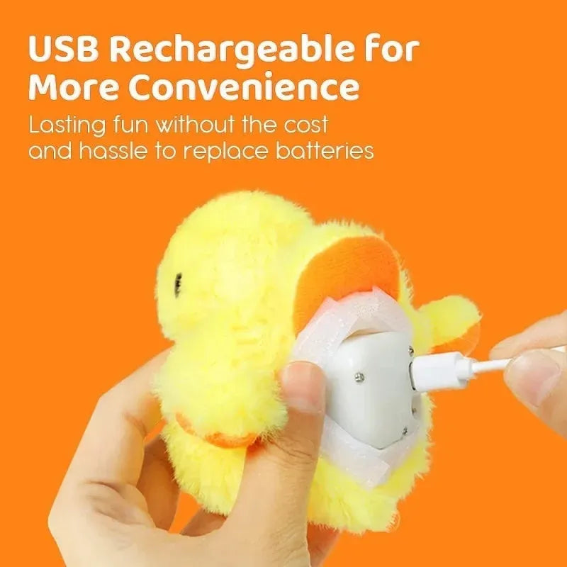 Yellow chick-shaped electric interactive cat toy with plush cover on a plain background.
