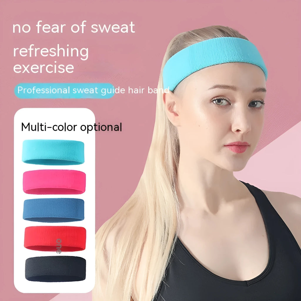 Elastic solid colour sports sweatband in black, shown stretched to demonstrate fit.