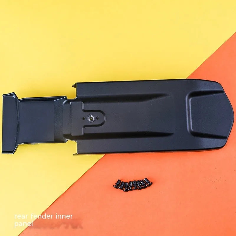 Carbon fibre lengthened rear mudguard and inner plate for Light Bee electric off-road bicycle.