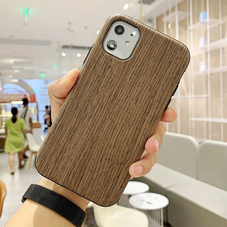 Wood phone case for iPhone showing rosewood, teak, and walnut timber options with natural grain patterns
