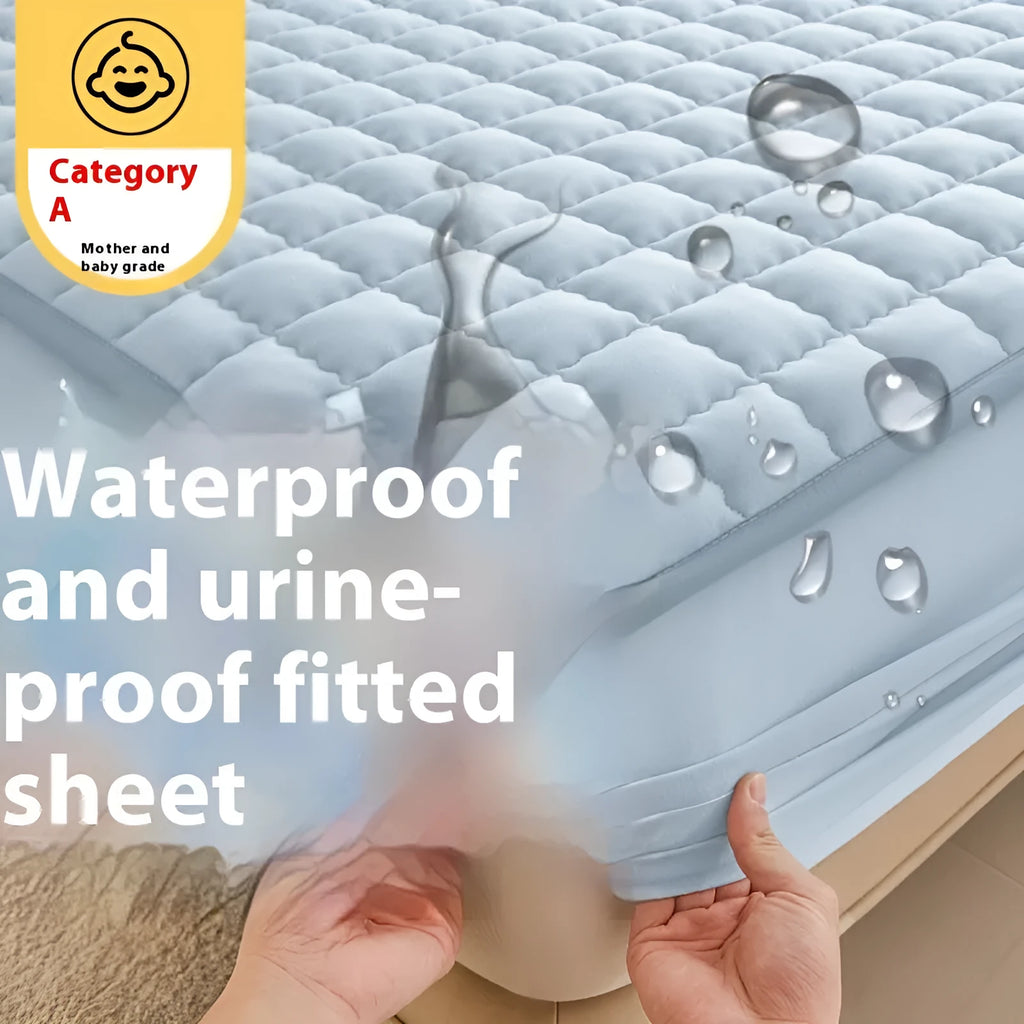 Blue washed cotton waterproof fitted sheet with elasticated edges on mattress.