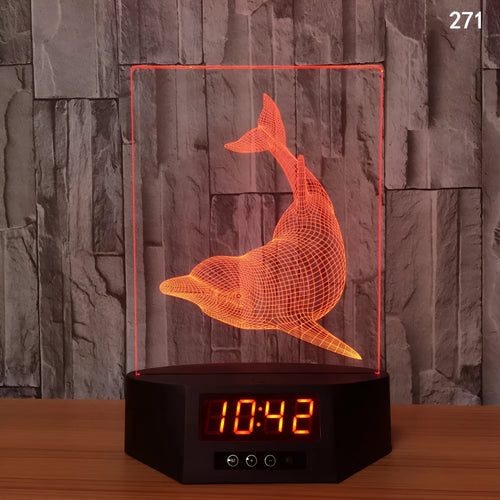Glowing blue 3D dolphin-shaped LED night light on a table with remote control.