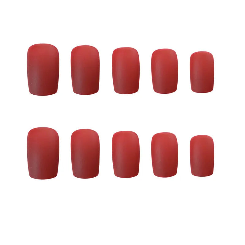 24 false nails in matte red medium length with glue adhesive in packaging