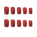 24 false nails in matte red medium length with glue adhesive in packaging