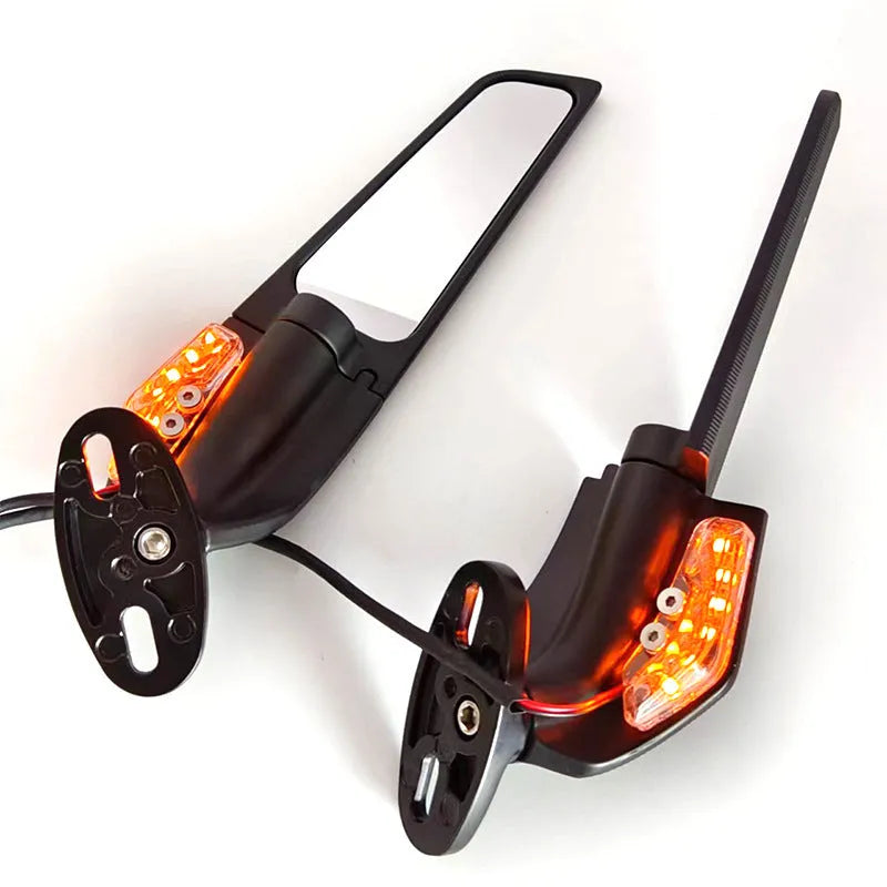 Pair of aluminium motorcycle spoiler rearview mirrors with convex glass lenses and integrated yellow running lights.