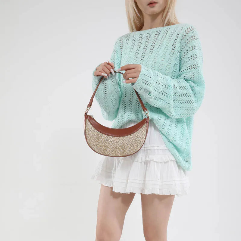 Hard-shell straw dumpling-shaped women's crossbody bag with contrast stitching and interior compartments