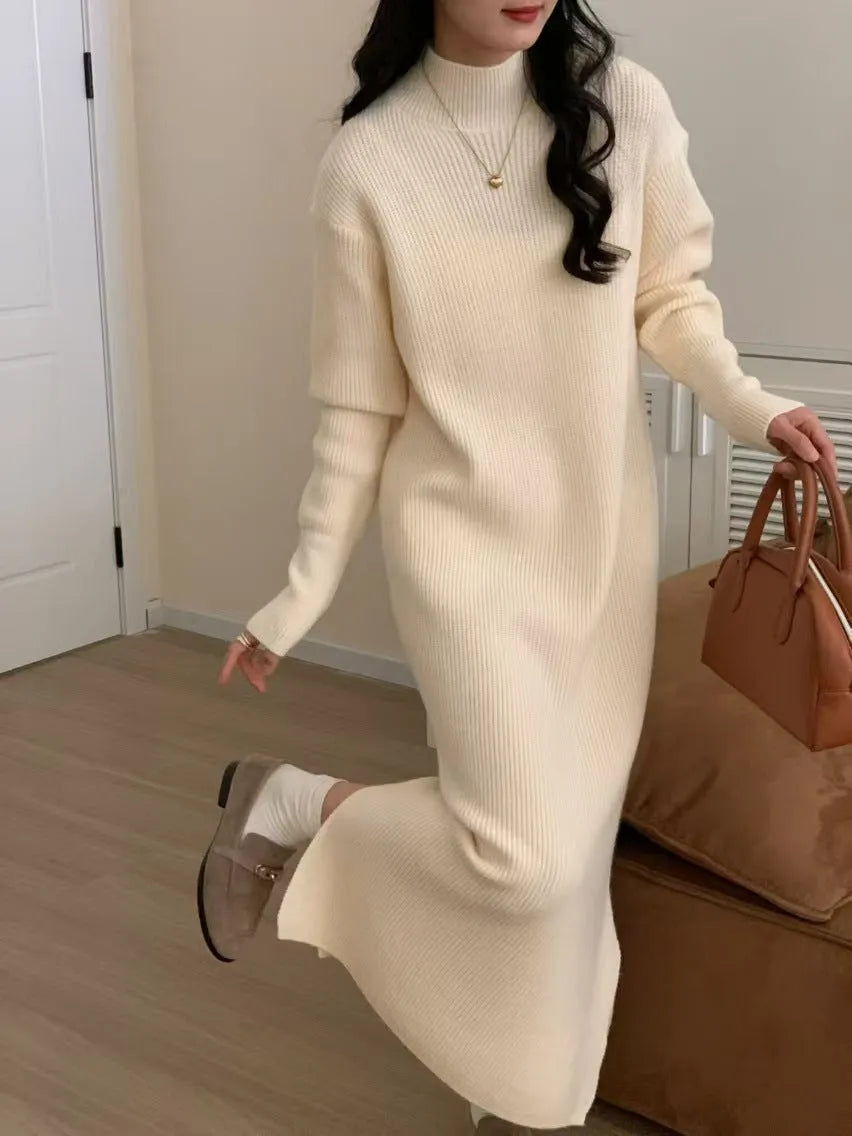 Acrylic knit high waist mid-length dress in solid colour with long sleeves.