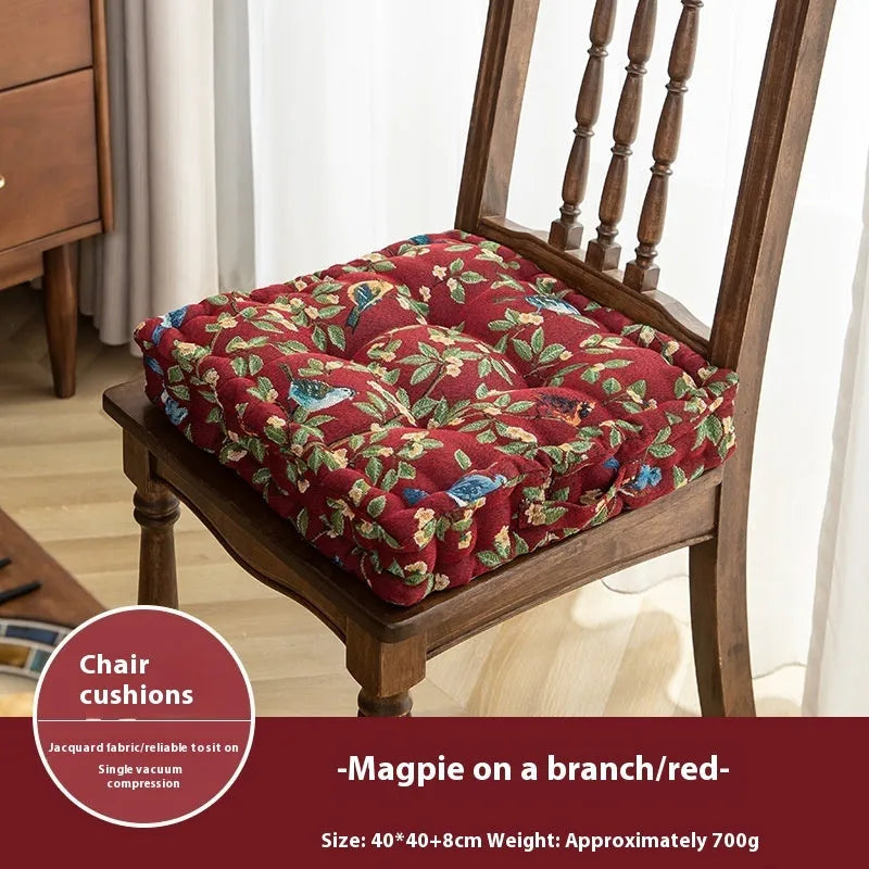 American style dining chair cushion in floral apricot pattern with bird motifs measuring 40x40x8cm