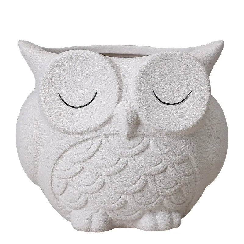 Handmade frosted ceramic owl flower pot in light pink for small succulents.