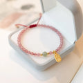 Strawberry quartz and garnet bead bracelet with hand-woven red rope in simple women's design