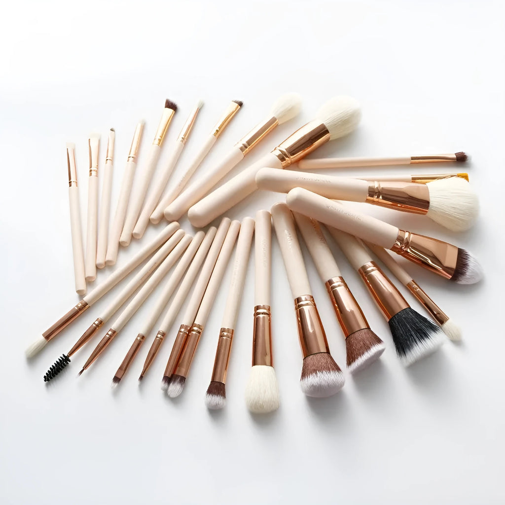 26 pink makeup brushes with wooden handles arranged in a PU storage bag