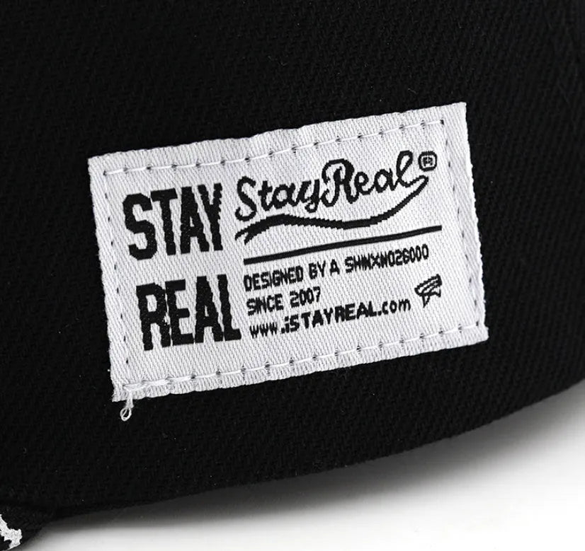 Cotton baseball cap with adjustable strap in black and white colour options