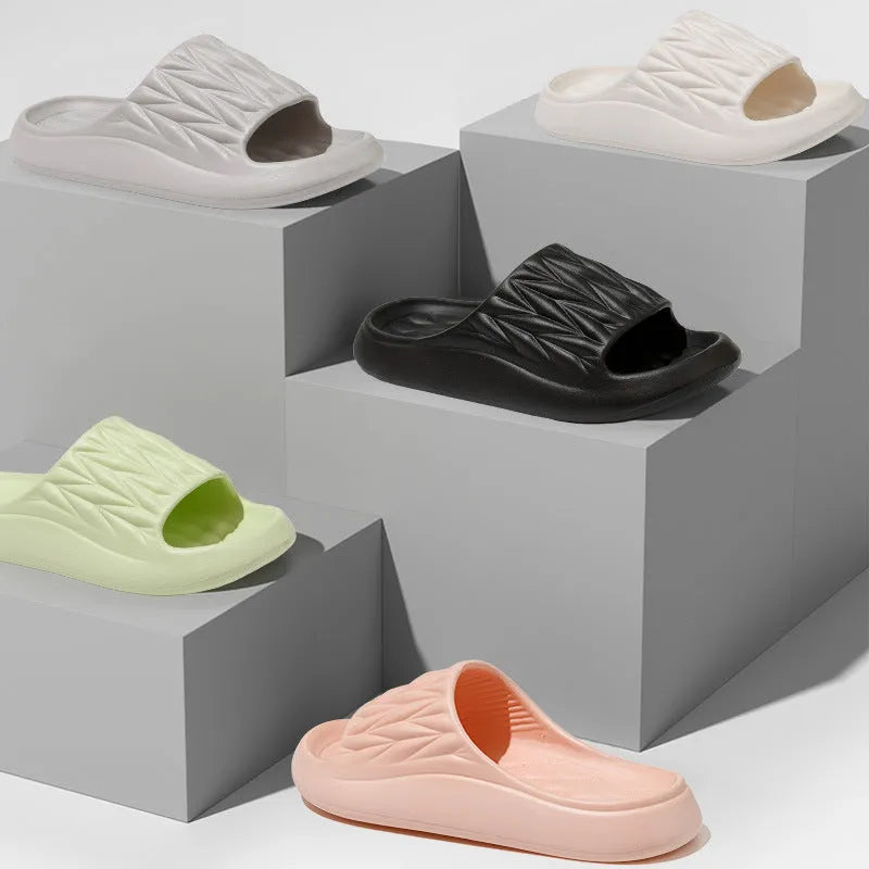 Leaf texture design EVA slippers in various colours showing non-slip sole detail