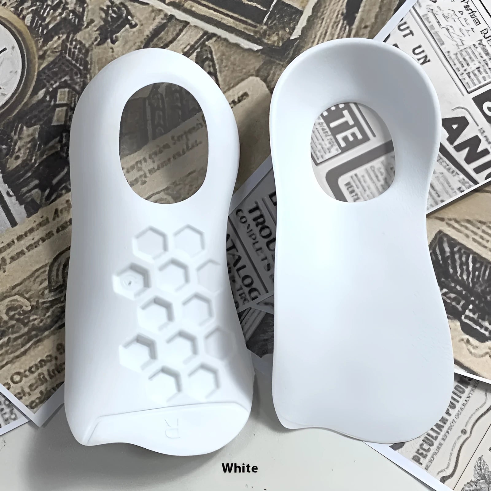 TPR arch support varus correction insoles in white, black, and skin colour for shoe sizes 35-45.