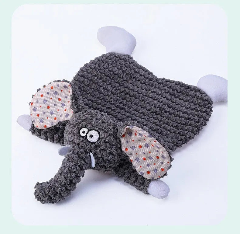 Brown plush fox dog toy with squeaker on a grey background.