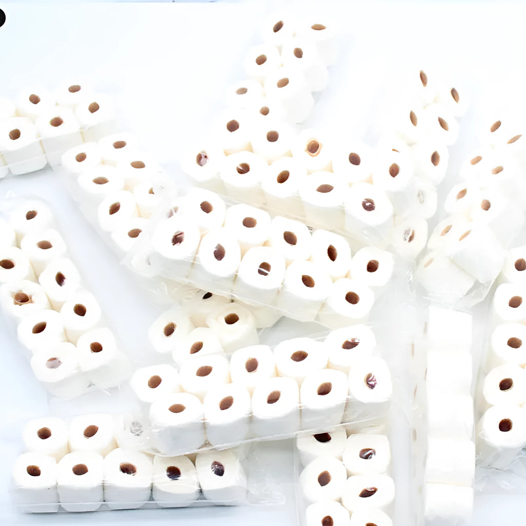 Paper simulated tissue roll model measuring 30mm wide 15mm deep 80mm tall