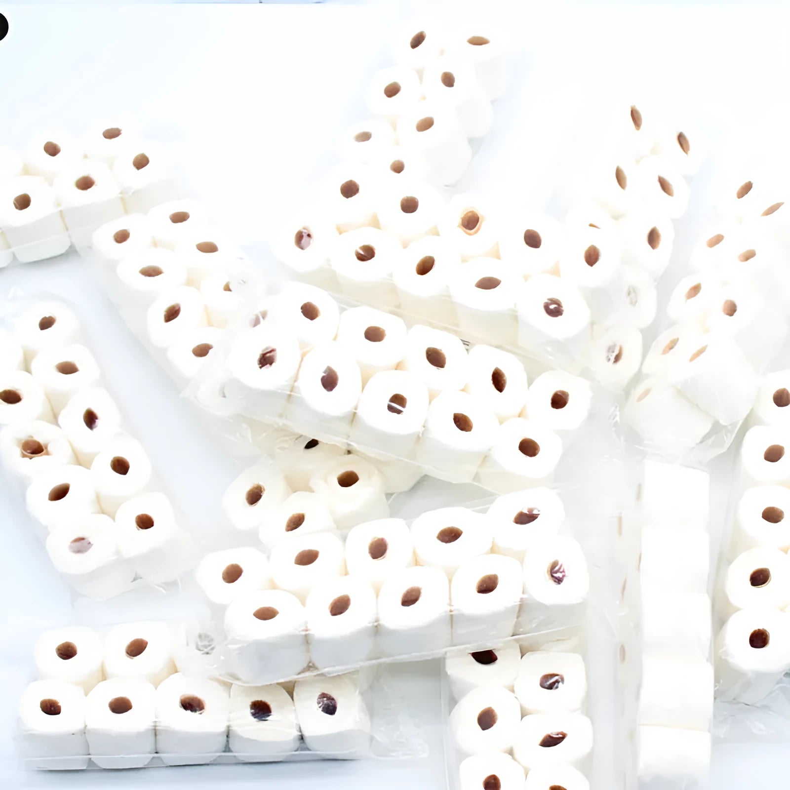 Paper simulated tissue roll model measuring 30mm wide 15mm deep 80mm tall