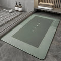 Cushioned blue oval bathroom floor mat on tiled flooring