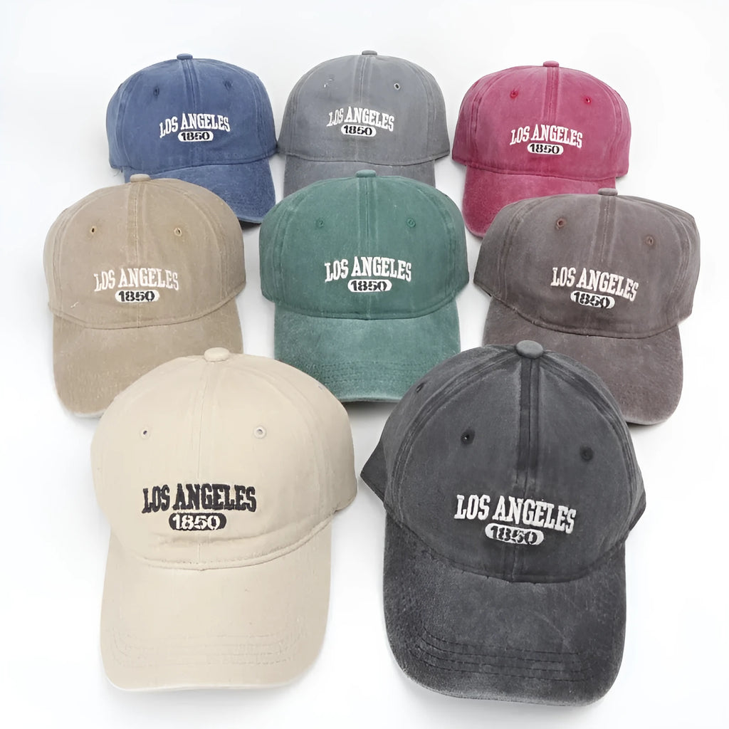 Retro peaked cap with distressed letter embroidery in beige colour with adjustable strap and conical crown