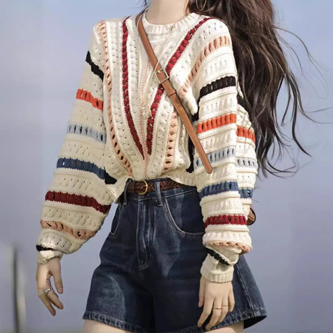 Rainbow striped hollow knit sweater with batwing sleeves and round neck