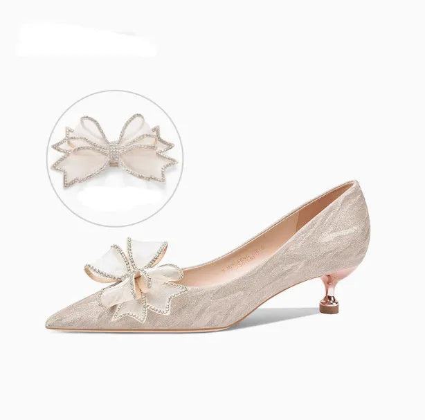 Champagne sequin pointed toe stiletto high heels with crystal detailing on low-cut vamp