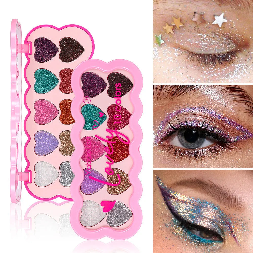 Pearlescent heart design eye shadow palette showing ten colours including white, beige, pink, purple, brown, blue, black, royal blue, maroon, and coral
