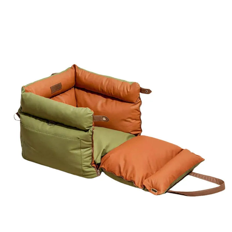 Green waterproof PU leather pet car nest bed for dogs on a car seat.
