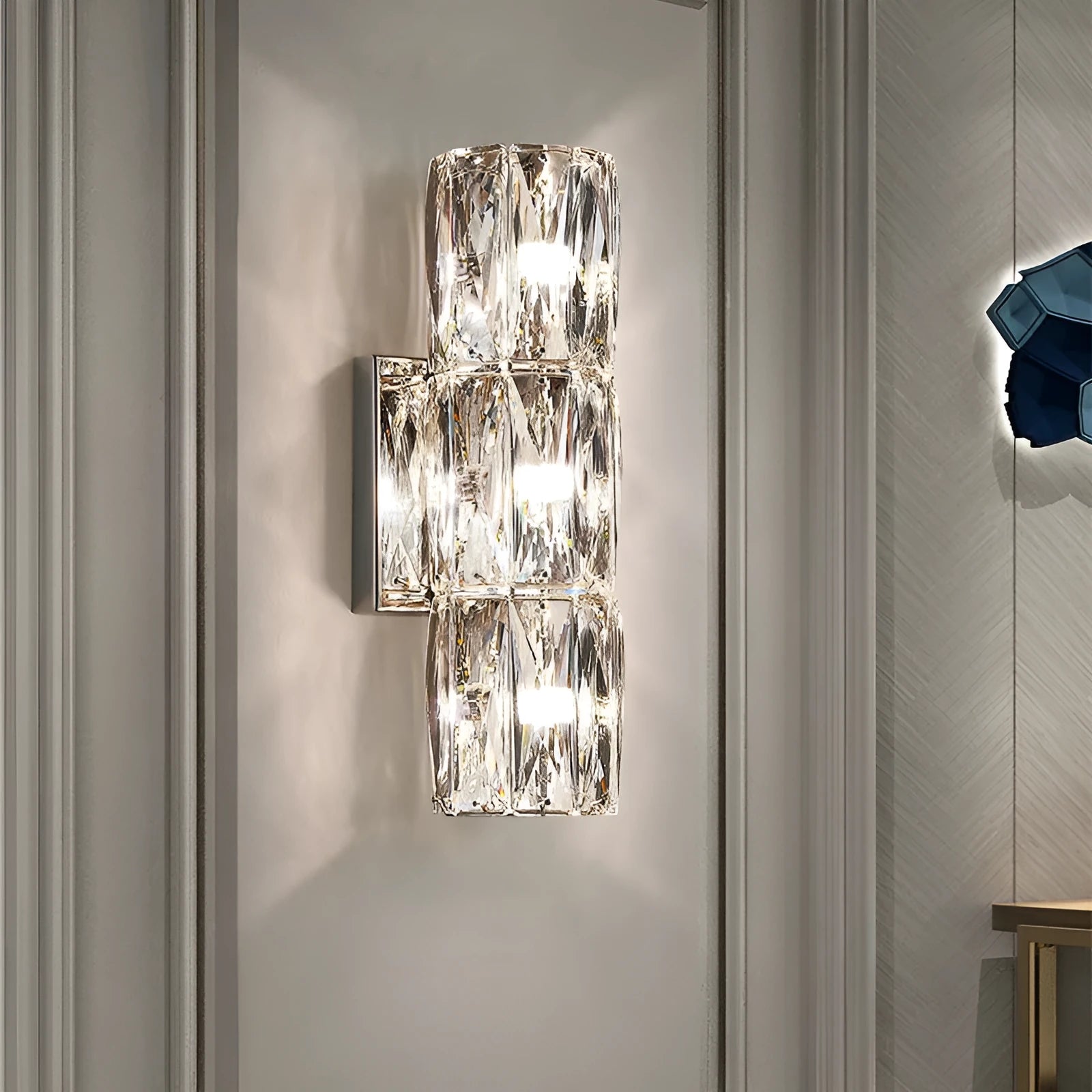 Crystal wall lamp with stainless steel base in chrome or gold finish, LED tricolour lighting, multiple size options