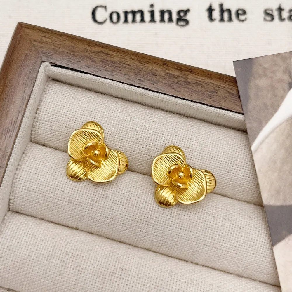 Retro flower fashion earrings for women with petal design in gold or silver electroplated finish