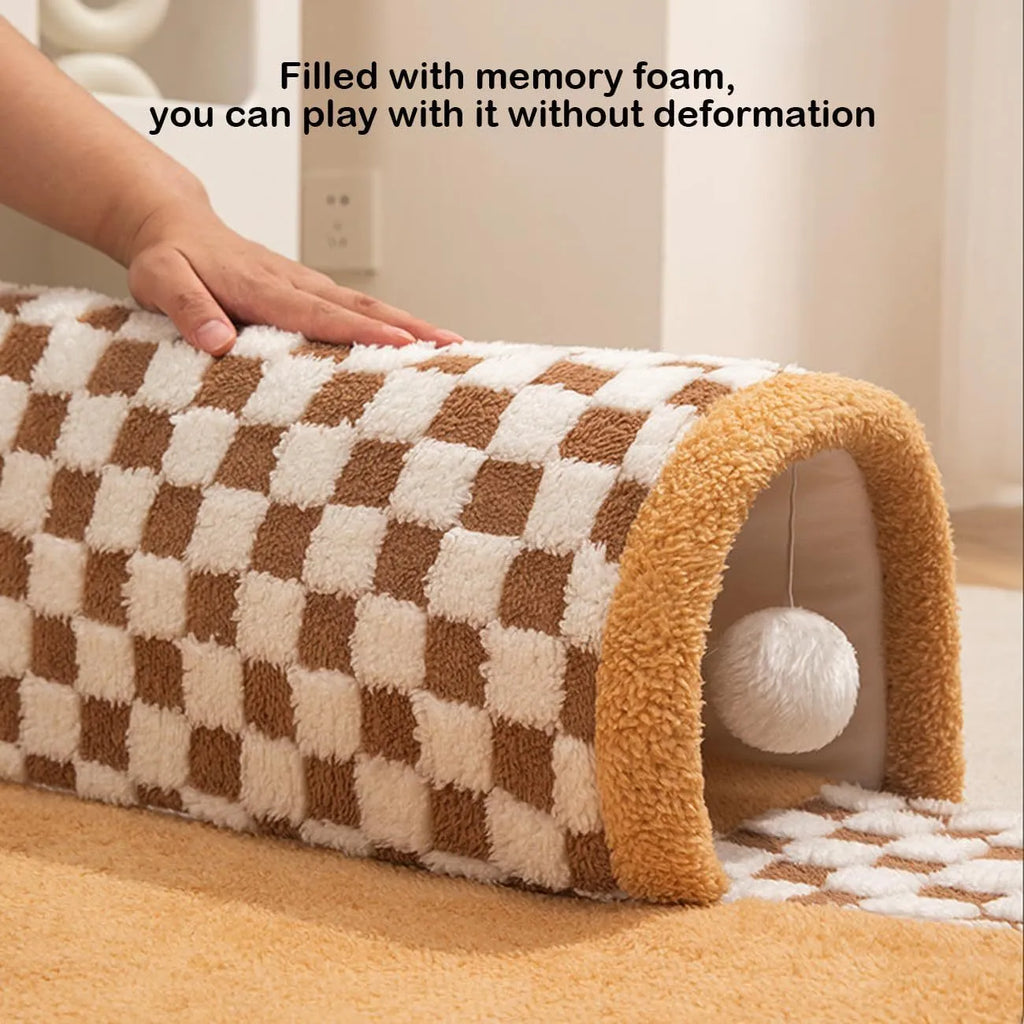Fan-shaped plush pet bed with integrated tunnel for cats and dogs in coffee colour.