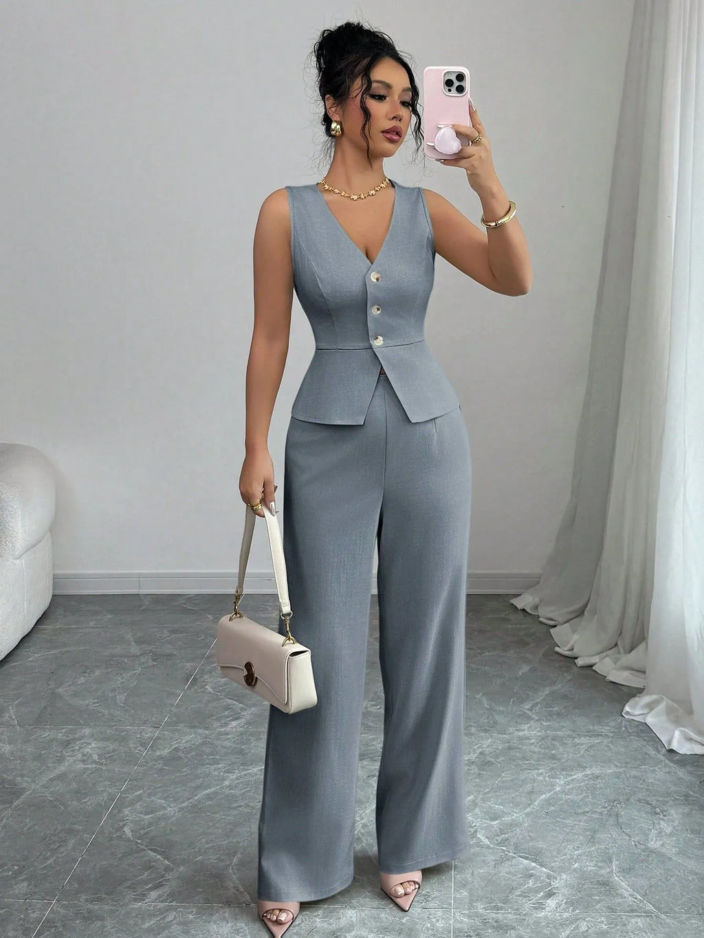 Women's black sleeveless vest and high waist trousers two-piece casual set
