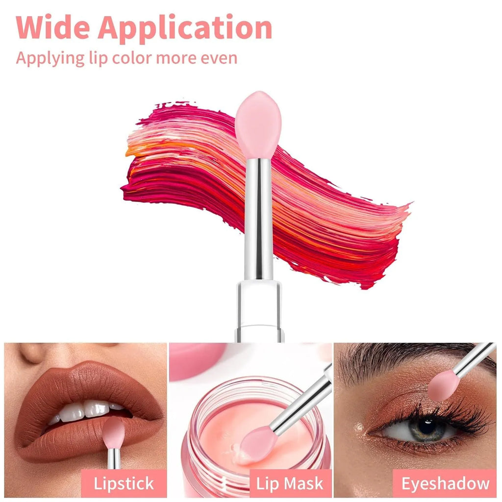 Set of eight coloured reusable silicone lip brushes with protective caps on a white background.