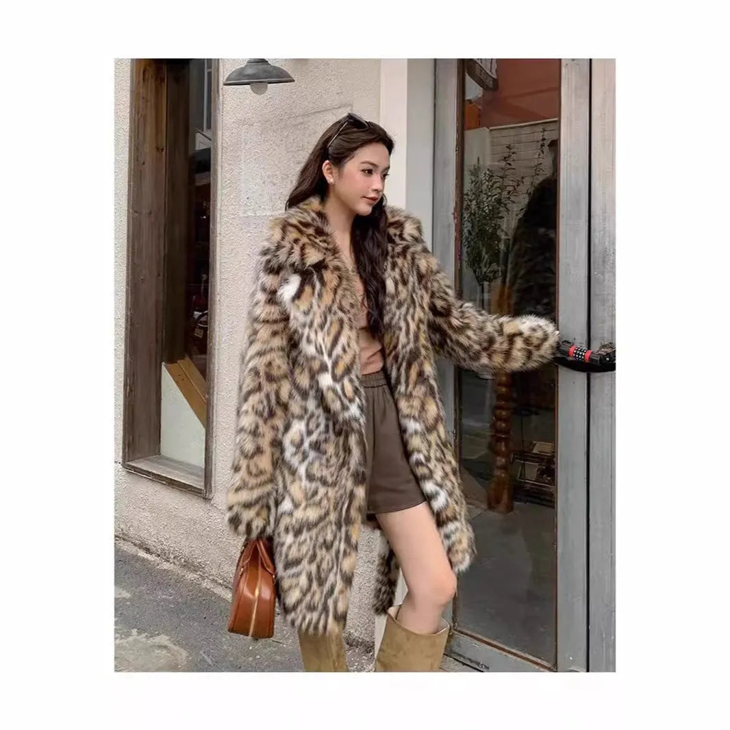 A long faux fur street fashion coat with a fur collar and pockets, shown in an urban setting.